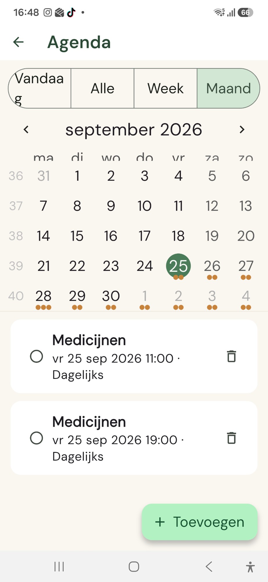 Agenda-scherm in maandweergave met afspraken en herinneringen